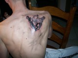 Thunderdome Tattoo deels ingekleurd met zwart